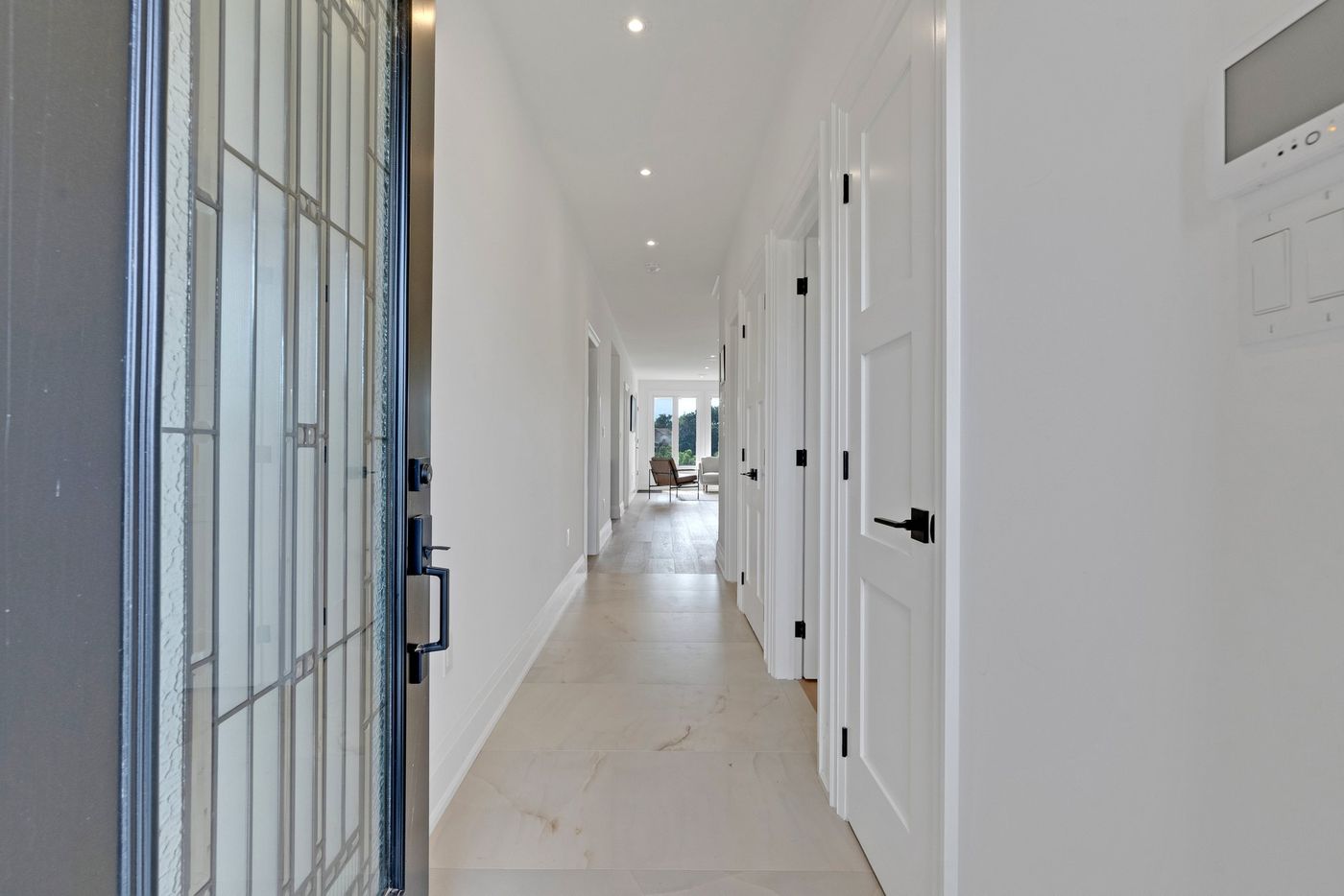 Front entry hallway with tile flooring