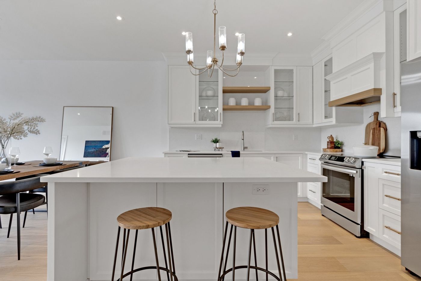 Kitchen island with brass chandelier