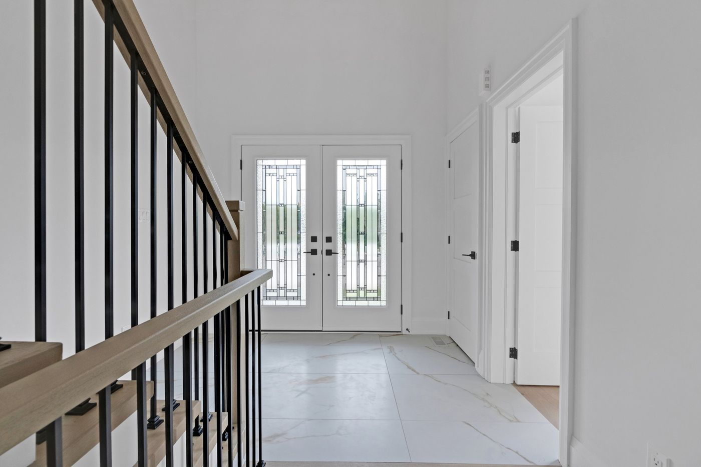 Front foyer with double leaded-glass doors
