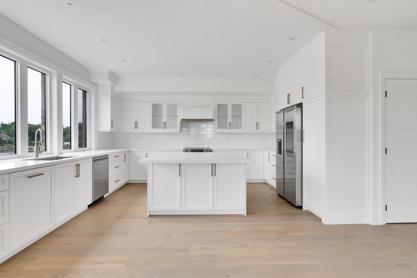 Kitchen with subway tile and stainless appliances